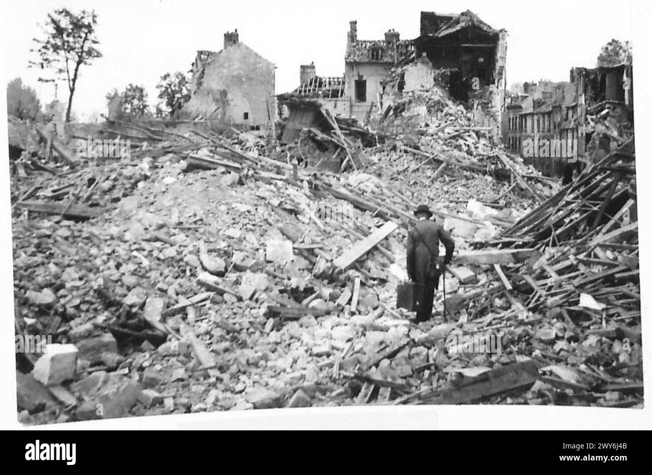 After the capture of Caen, damage to buildings blocked streets ...