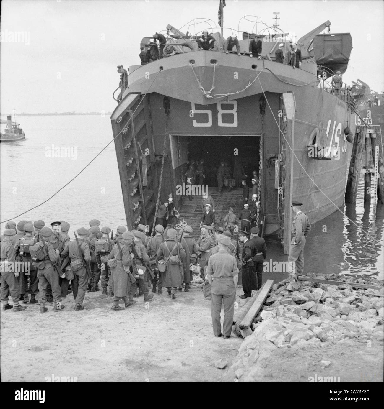 Hards British troops board an American LST at the Hards in Hamburg during ...