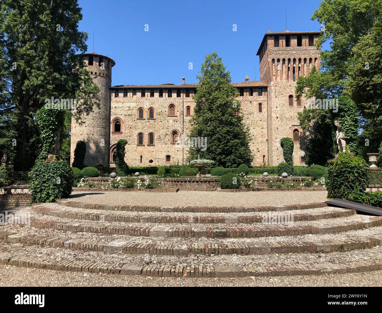 Grazzano Visconti, italy - june 11, 2023: landscaped view of medieval castle refurbished by Visconti di Modrone Stock Photo