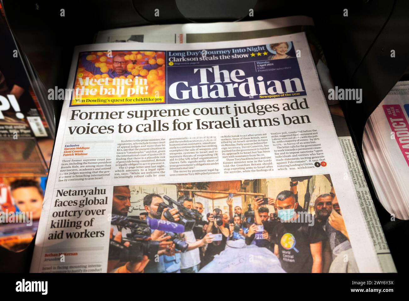'Former supreme court judges add voices to calls for Israeli arms ban' Guardian newspaper headline front page Israel Gaza war article 4 April 2024 UK Stock Photo