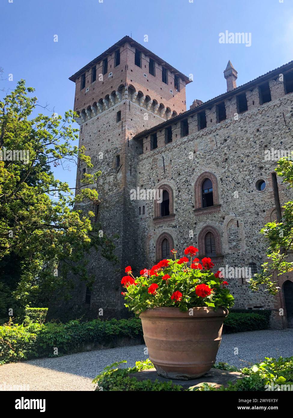 Grazzano Visconti, italy - june 11, 2023: view of medieval castle restored by Giuseppe Visconti di Modrone in Piacenza province, stone and brick walls Stock Photo