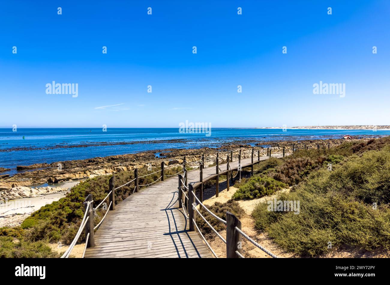 Beachfront walkway in small West Coast town of Port Nolloth, South Africa Stock Photo