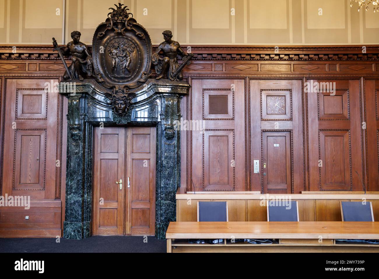 Nuremberg, Germany. 04th Apr, 2024. View of the entrance door (left) and the dock (back right) in the historic jury courtroom 600 in the 'Memorium Nuremberg Trials' in the Nuremberg Justice Building. The 'Main War Crimes Trial' of the International Military Tribunal against leading representatives of the National Socialist regime took place in Hall 600 of the Nuremberg Justice Building from November 20, 1945 to October 1, 1946. Credit: Daniel Karmann/dpa/Alamy Live News Stock Photo