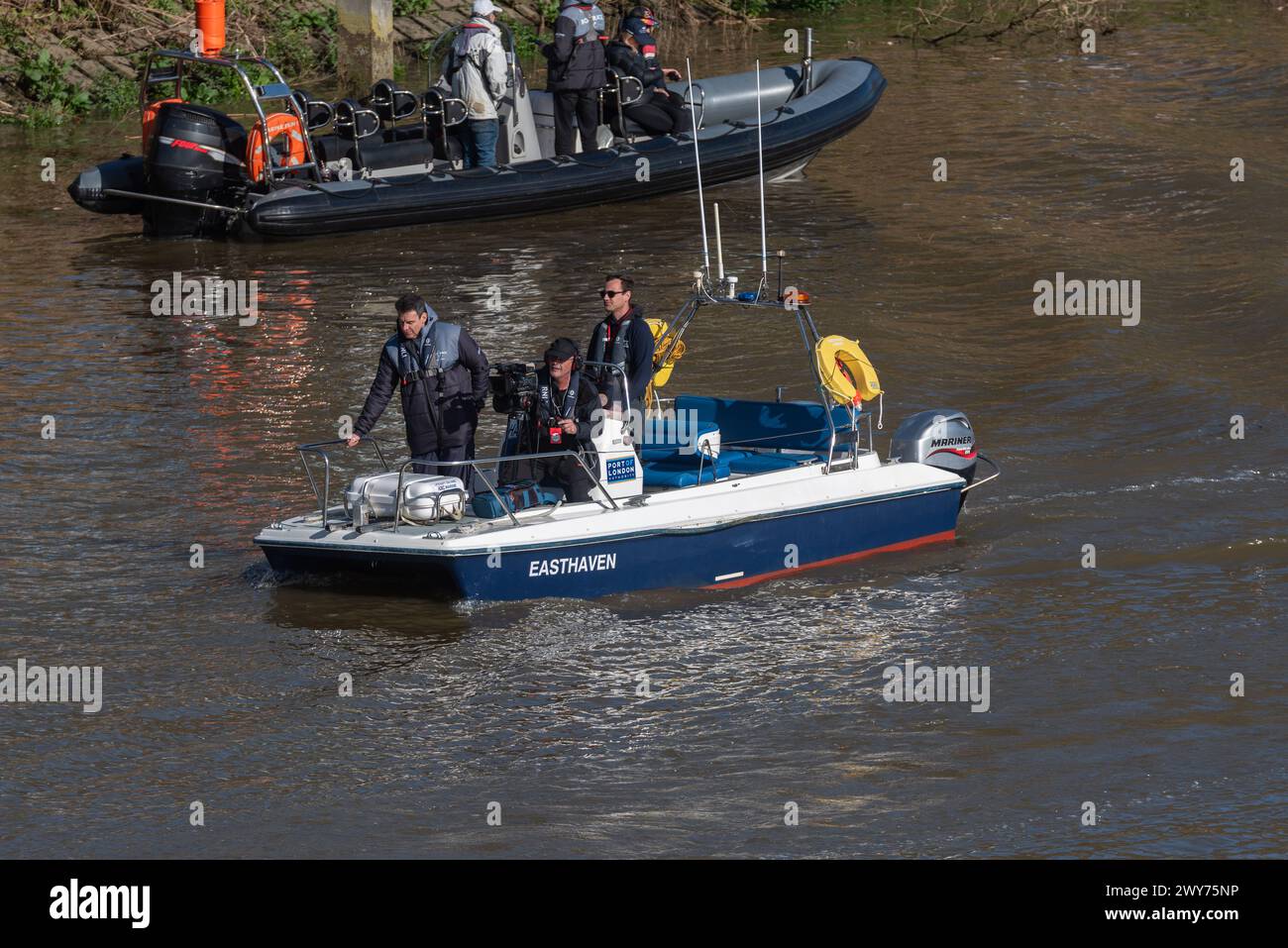 TV camera crew on PLA boat named Easthaven at the University Boat Race on the River Thames. Port of London Authority vessel Stock Photo