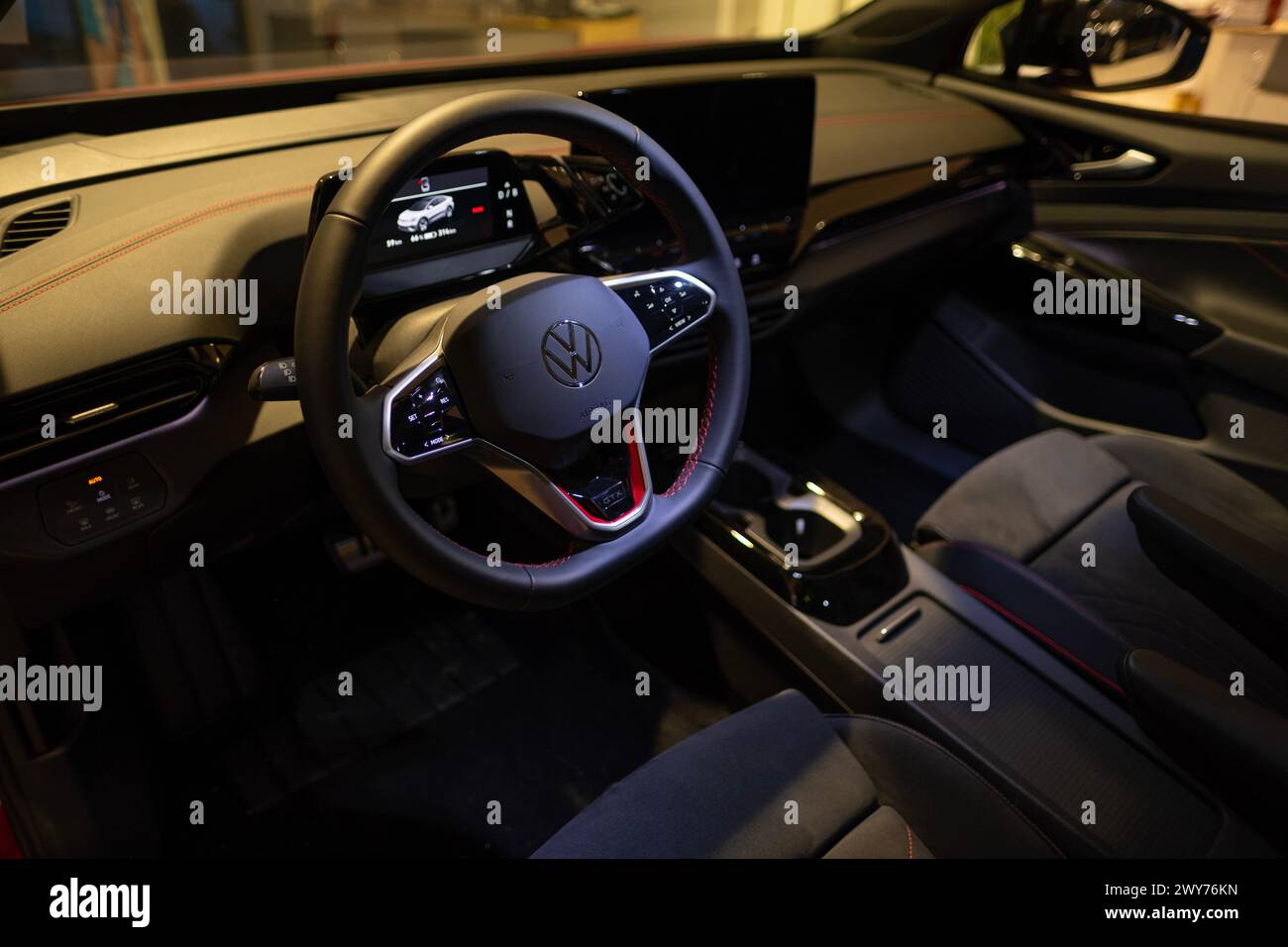 Spacious interior, steering wheel, cockpit, Volkswagen Group МЕВ manufacturer, digital panel instruments, automotive technology, roomy suitable interi Stock Photo
