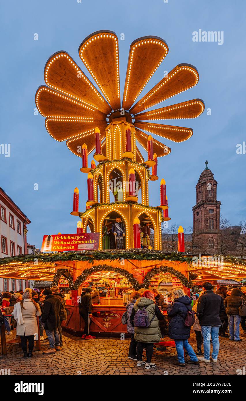 Heidelberg Christmas market on the University Square  in the background the Jesuit Church tower. Heidelberg, Germany, Europe Stock Photo