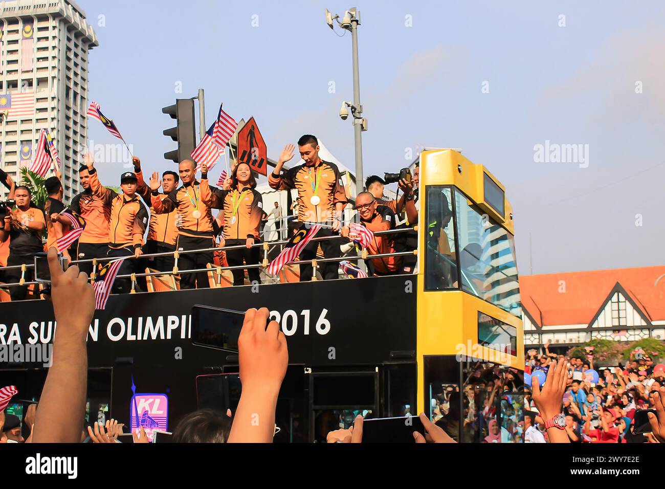 KUALA LUMPUR - AUGUST 31, 2017: A row of athletes on the bus consists of Lee Chong Wei, Pandelela Rinong and other during 60th Celebrations, Malaysian Stock Photo