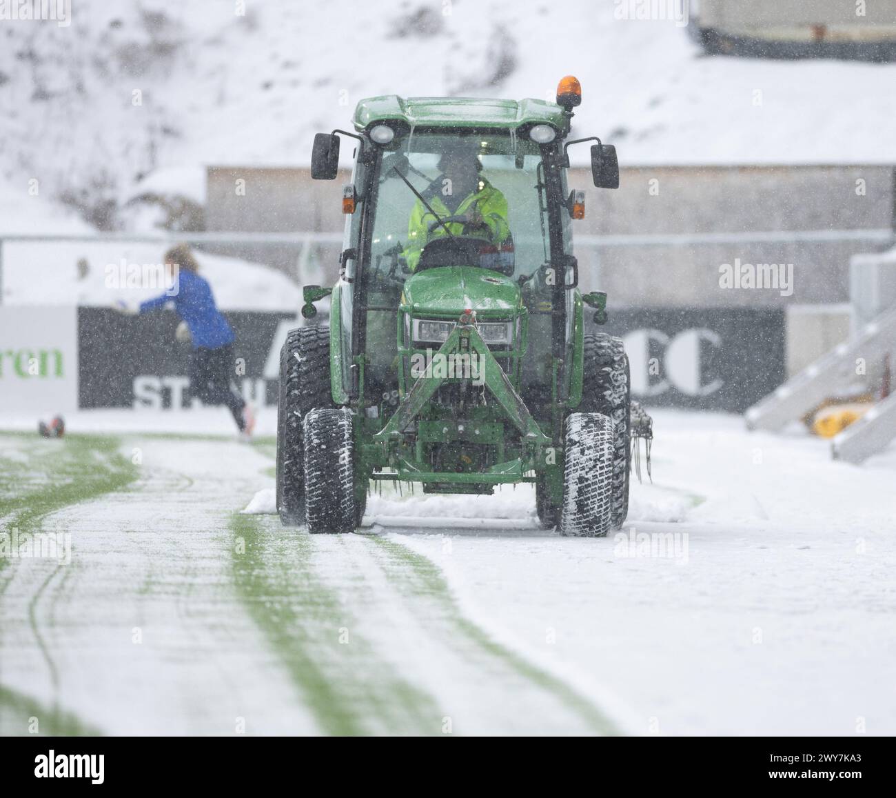Hamar, Norway. 04th Apr, 2024. Hamar, Norway, April 4th 2024: snow plowing are seen before the U23 International friendly game between Norway and the Netherlands at Briskeby Stadium in Hamar, Norway (Ane Frosaker/SPP) Credit: SPP Sport Press Photo. /Alamy Live News Stock Photo