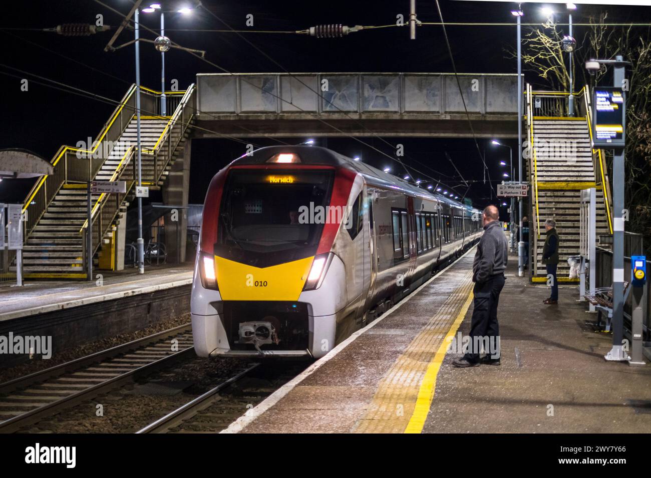Greater Anglia train arriving at Diss, Norfolk railway station. London train going to Norwich. Stock Photo