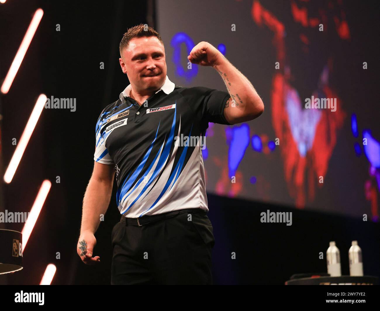 Manchester, UK. 04th Apr, 2025. Gerwyn Price celebrates throwing a nine