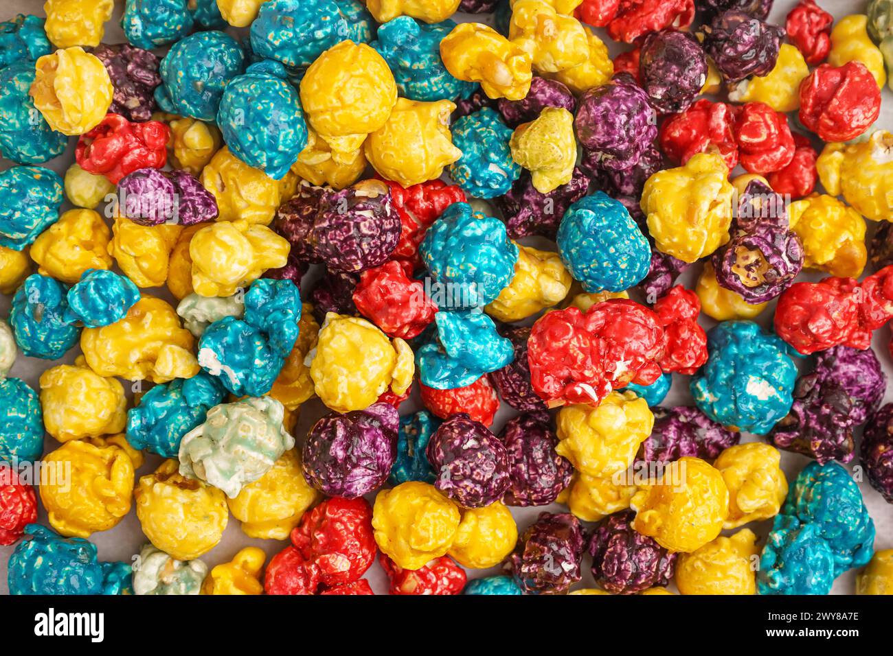 Texture of sweet colorful popcorn as background Stock Photo - Alamy