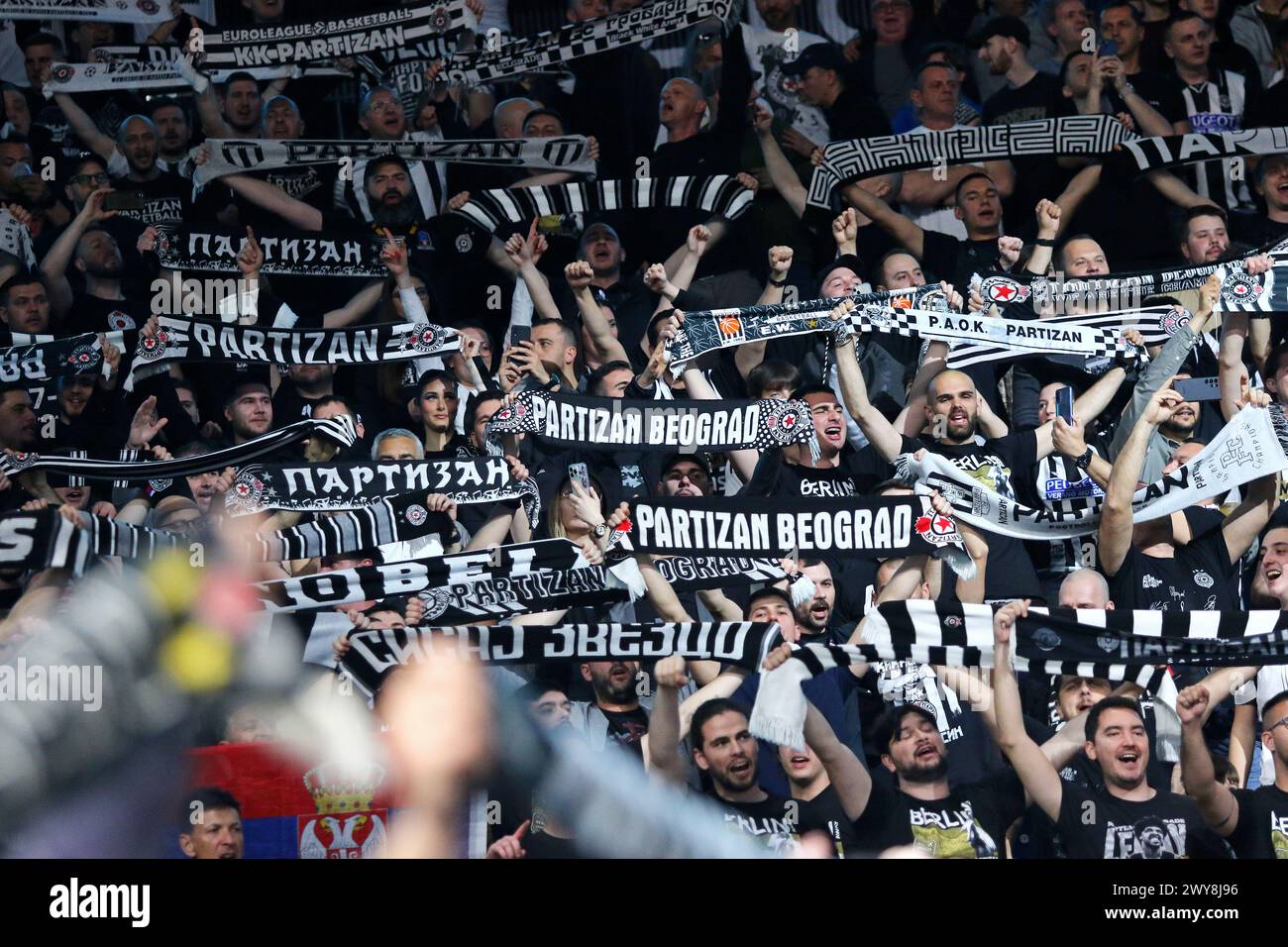 Berlin, Germany. 4th April 2024: Partizan Belgrade supporters show their support during the Turkish Airlines EuroLeague basketball game against ALBA Berlin at Uber Arena in Berlin. Credit: Oleksandr Prykhodko/Alamy Live News Stock Photo