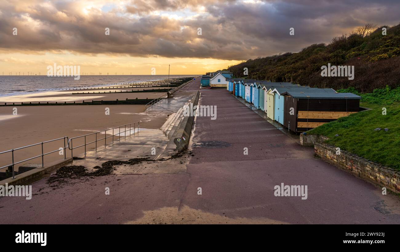 Beach huts on the North Sea coast at Frinton-on-Sea, Essex, England, UK ...