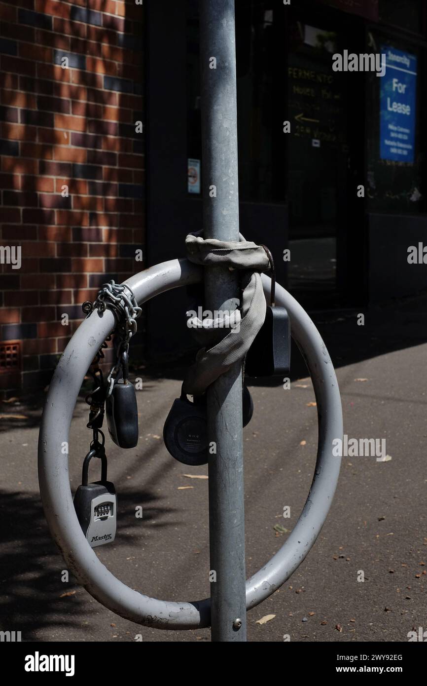 Key safe boxes strapped to a utility pole unsightly collection