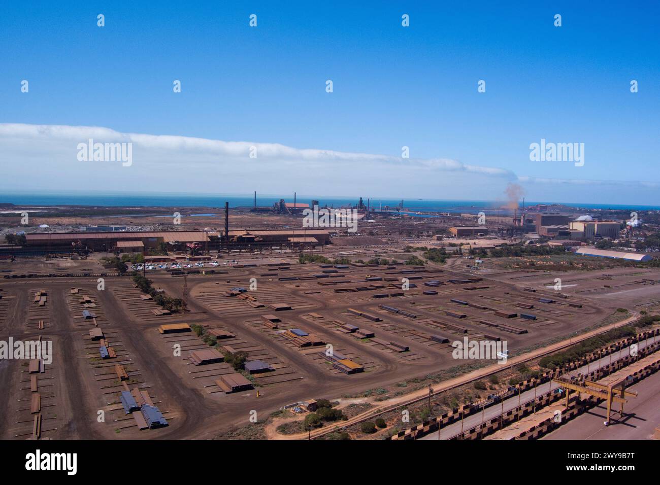 Aerial of freight yards with steel products ready for rail and road transport from Whyalla South Australia Stock Photo