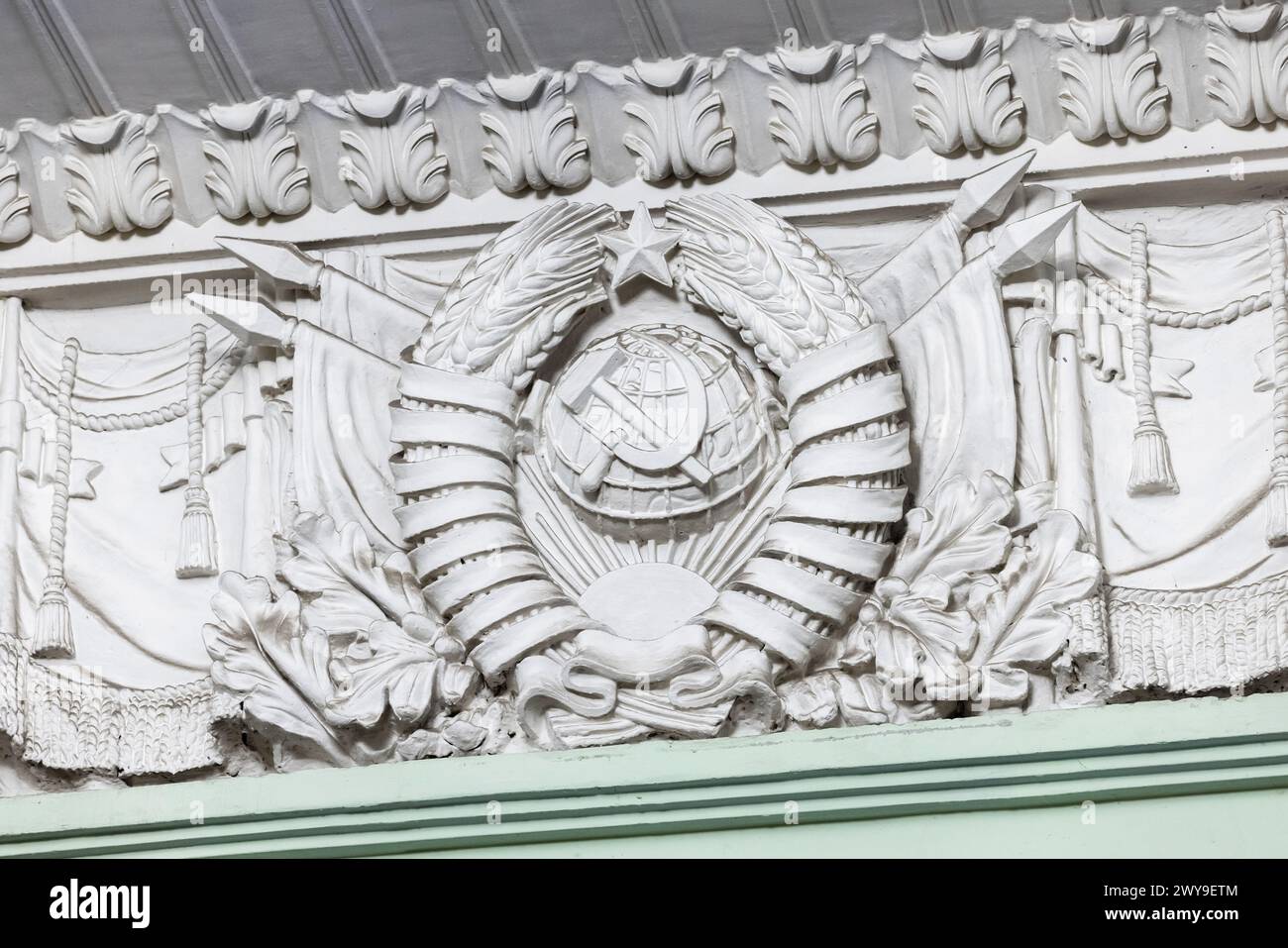 White bas-relief of the coat of arms of the USSR, portico decoration Stock Photo