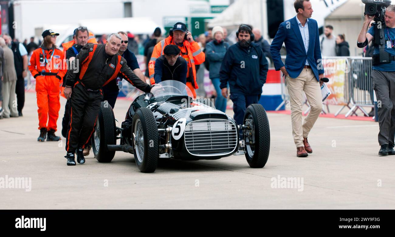 A continuation version of the Legendary Pre-war BRM V16 Formula One Car, in the international paddock, at the 2023 Silverstone Festival. Stock Photo