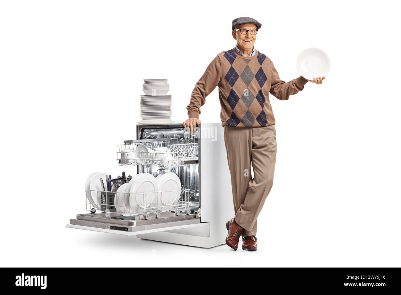 Elderly man leaning on a dishwasher and holding a plate isolated on