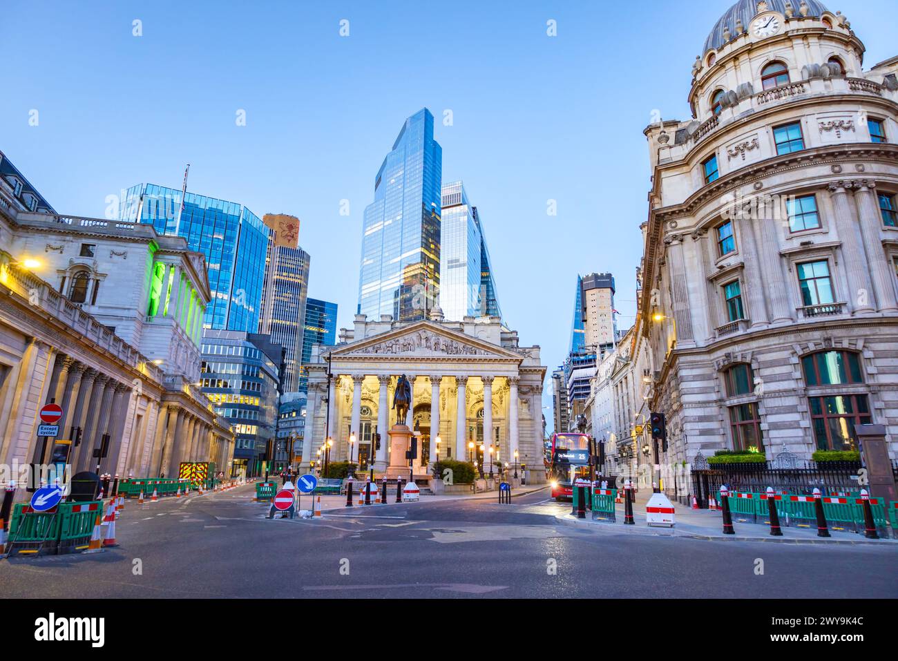 London, UK - May 20, 2023: The Royal Exchange in London and surrounding buildings at sunset. Was founded in the 16th century by Sir Thomas Gresham to Stock Photo