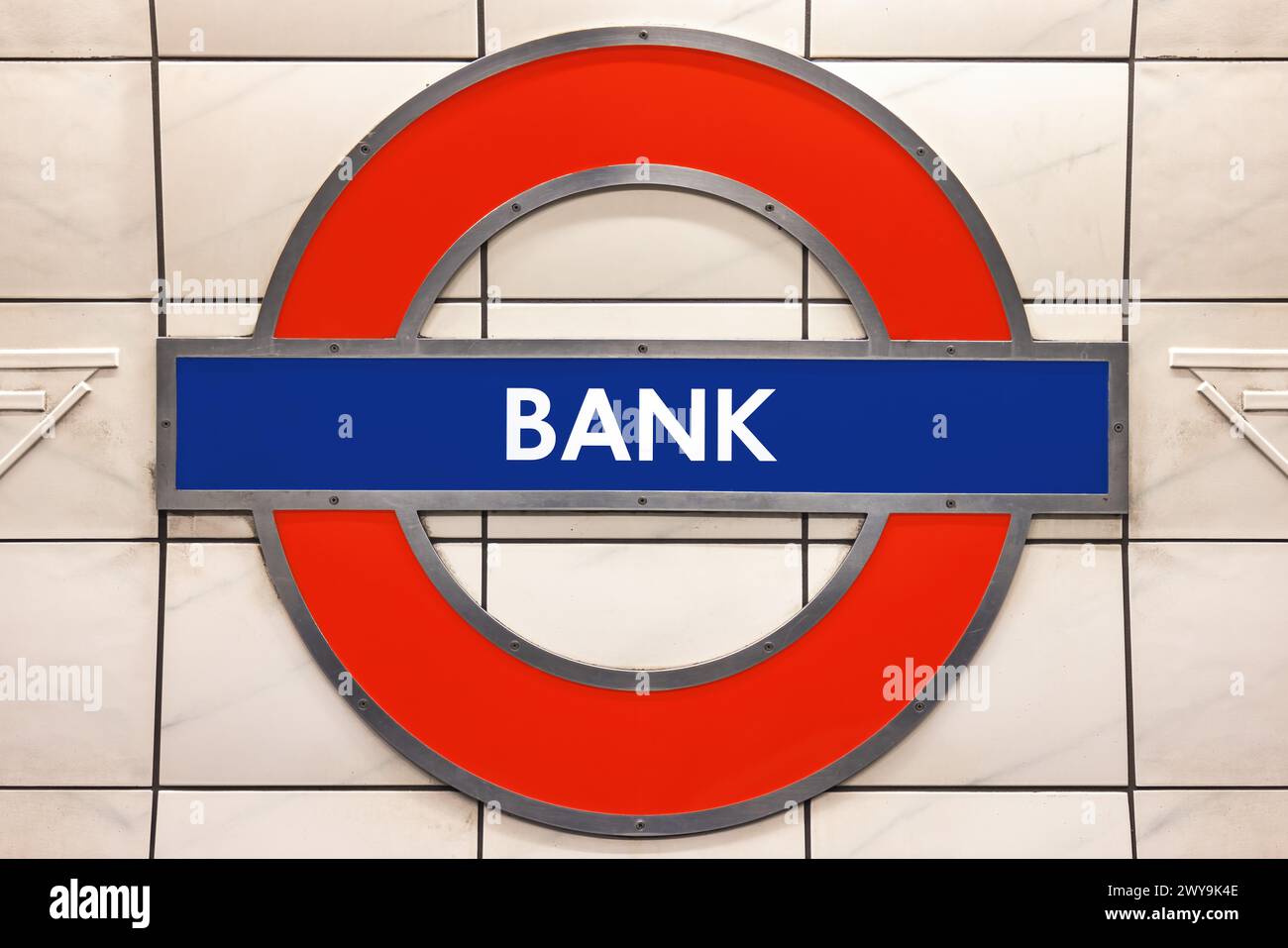 London, UK - May 20, 2023:  London Underground roundel shaped sign in Bank Station. The London Underground is the oldest underground railway in the wo Stock Photo