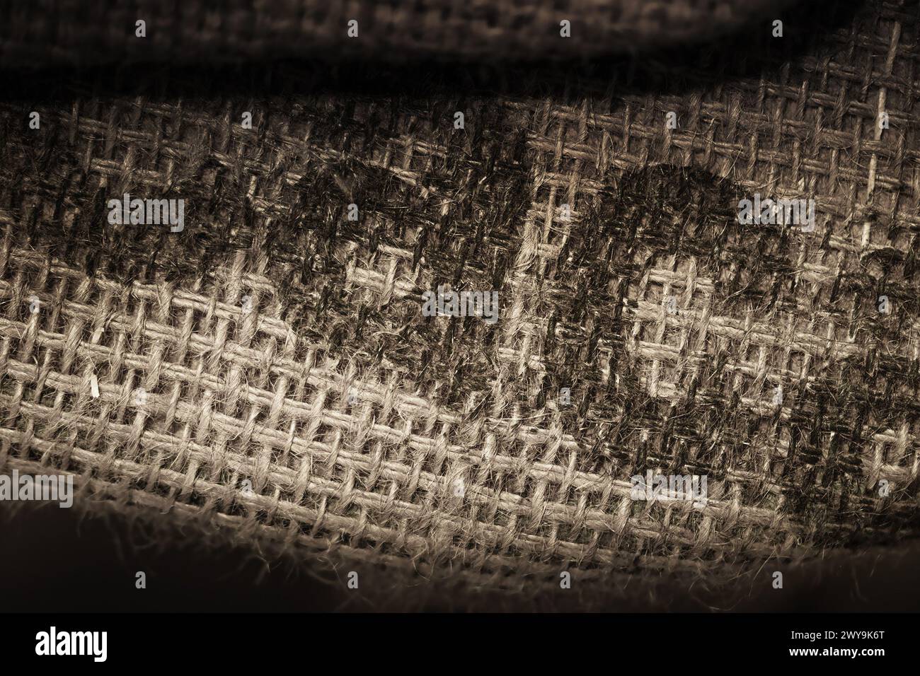 Dark brown burlap background. Jute sackcloth bagging canvas texture Stock Photo