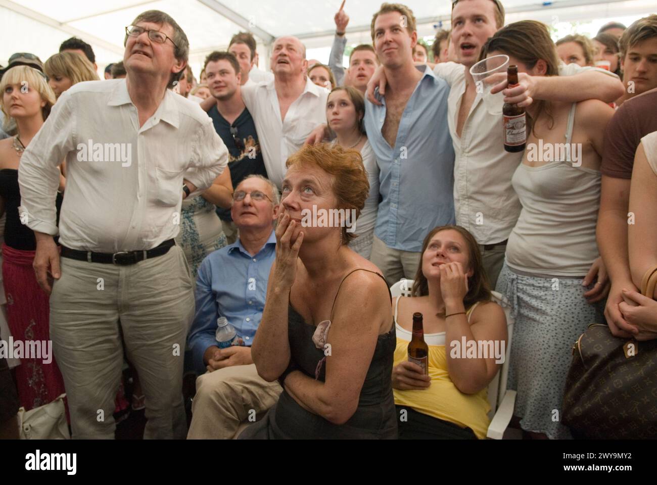 World Cup Football 2006. England v Portugal. The penalty shoot out England went on to lose. Fans photographed in beer tent marquee watching the football game on specially erected televisions sets. Oxfordshire UK 2000s HOMER SYKES. Stock Photo