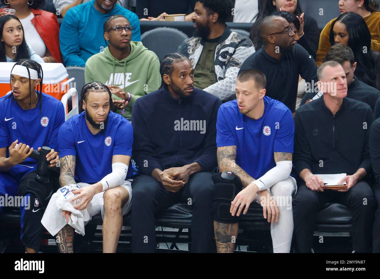 Los Angeles, United States. 04th Apr, 2024. Los Angeles Clippers' Kawhi Leonard (C) watches from the bench during an NBA basketball game against the Denver Nuggets at Crypto.com Arena. Clippers 102:100 Nuggets Credit: SOPA Images Limited/Alamy Live News Stock Photo