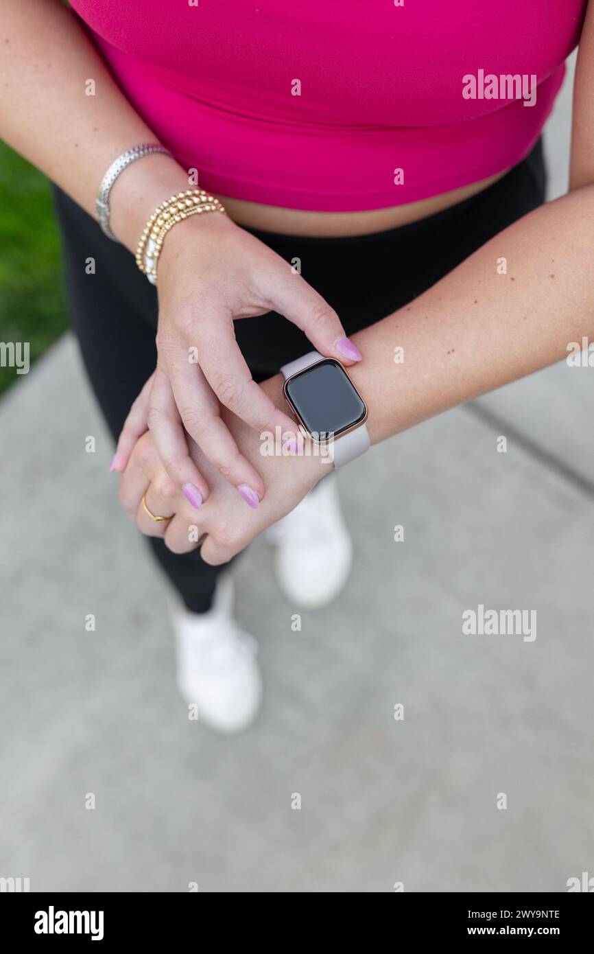 Fashionable smartwatch on fitness enthusiast Stock Photo