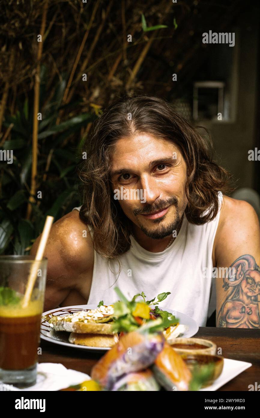 Portrait of a man in a restaurant at lunchtime Stock Photo Alamy
