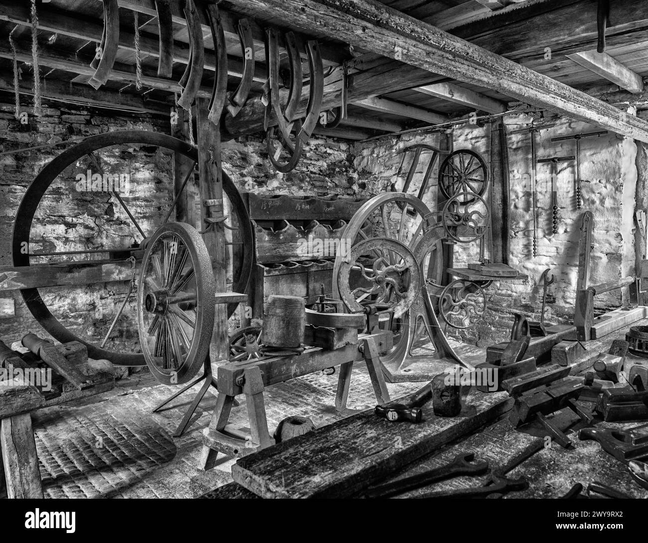 Traditional wheelwrights workshop at Cotehele Mill, Calstock, Cornwall, England, UK Stock Photo
