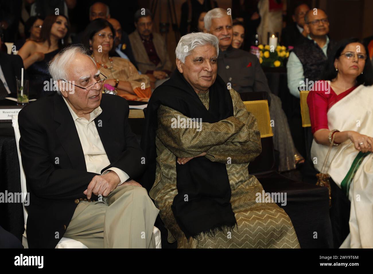 NEW DELHI, INDIA - MARCH 16: Bollywood screenwriter, lyricist and poet Javed Akhtar and Congress leader Kapil Sibal during the launch of Fali Nariman Scholarship and Annual Lecture series, organized by Mohit Saraf, founder of Saraf and Partners, on March 16, 2024 in New Delhi, India. (Photo by Shantanu Bhattacharya/Hindustan Times/Sipa USA ) Stock Photo