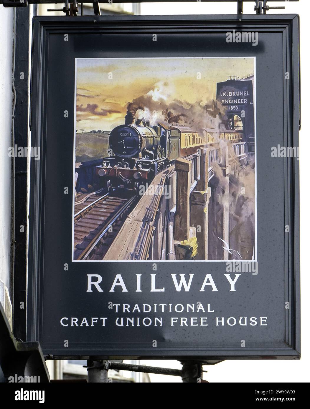 Traditional hanging pub sign at The Railway Hotel - a Craft Union public house - Fore Street, Saltash, Cornwall, England, UK Stock Photo