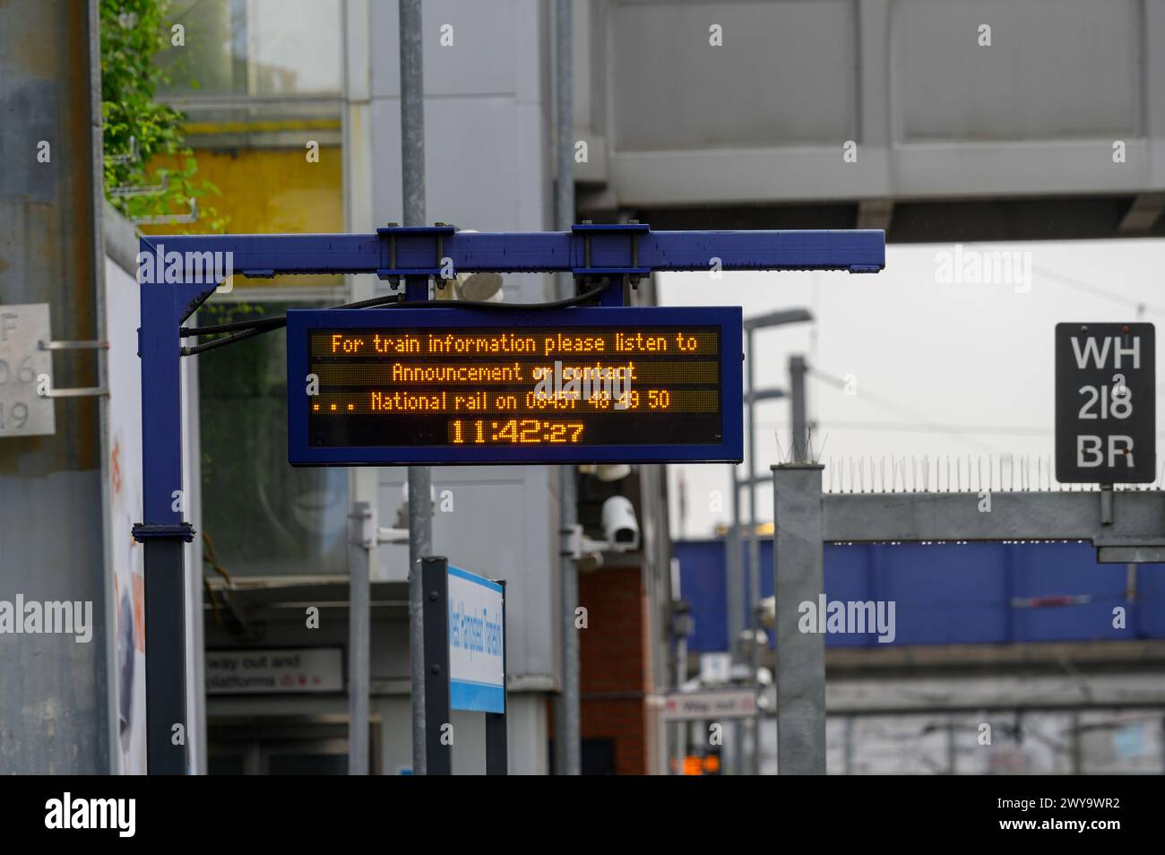 Digital information display on a railway station platform, West Hampstead station, London, England. Stock Photo