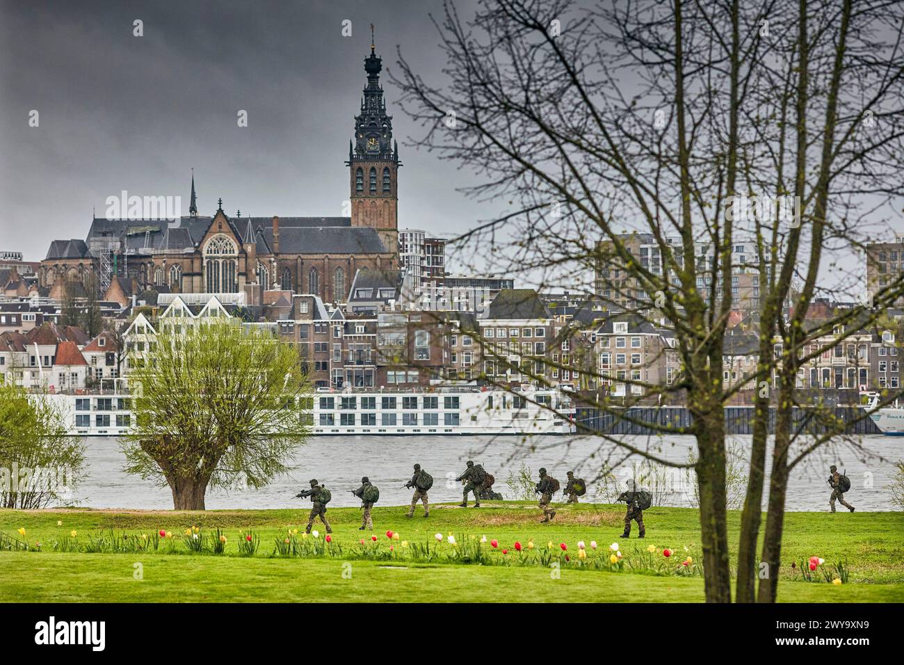 Nijmegen, Netherlands. 04th Apr, 2024. Members of the 11 Air Assault Brigade taking positions near the River Waal during an exercise. The exercise named BEVOSEAL during 02 until 05 April, will take place in urban areas instead of military training grounds. Missions in the past, such as those in Iraq, Afghanistan, Mali, and Romania, have all occurred among the local people, according to the Dutch Army. (Photo by Norbert Voskens/SOPA Images/Sipa USA) Credit: Sipa USA/Alamy Live News Stock Photo