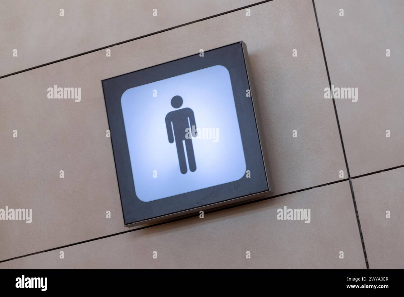 Symbol men at a toilet in Alicante airport in Spain Stock Photo
