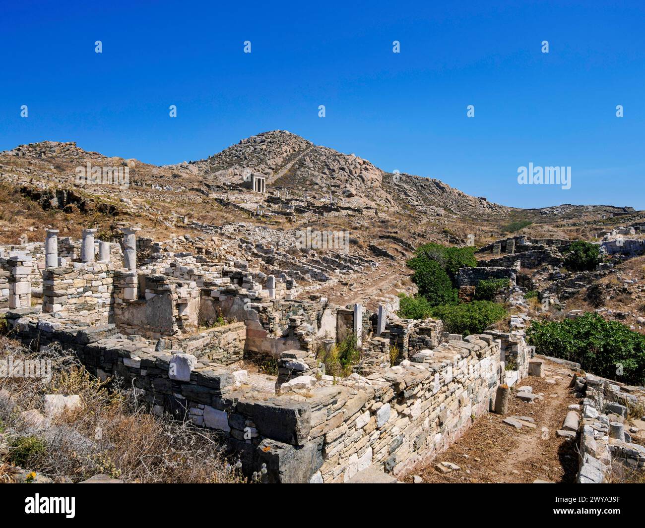 View towards the Temple of Isis and Mount Kynthos, Delos Archaeological Site, UNESCO World Heritage Site, Delos Island, Cyclades, Greek Islands, Greec Stock Photo