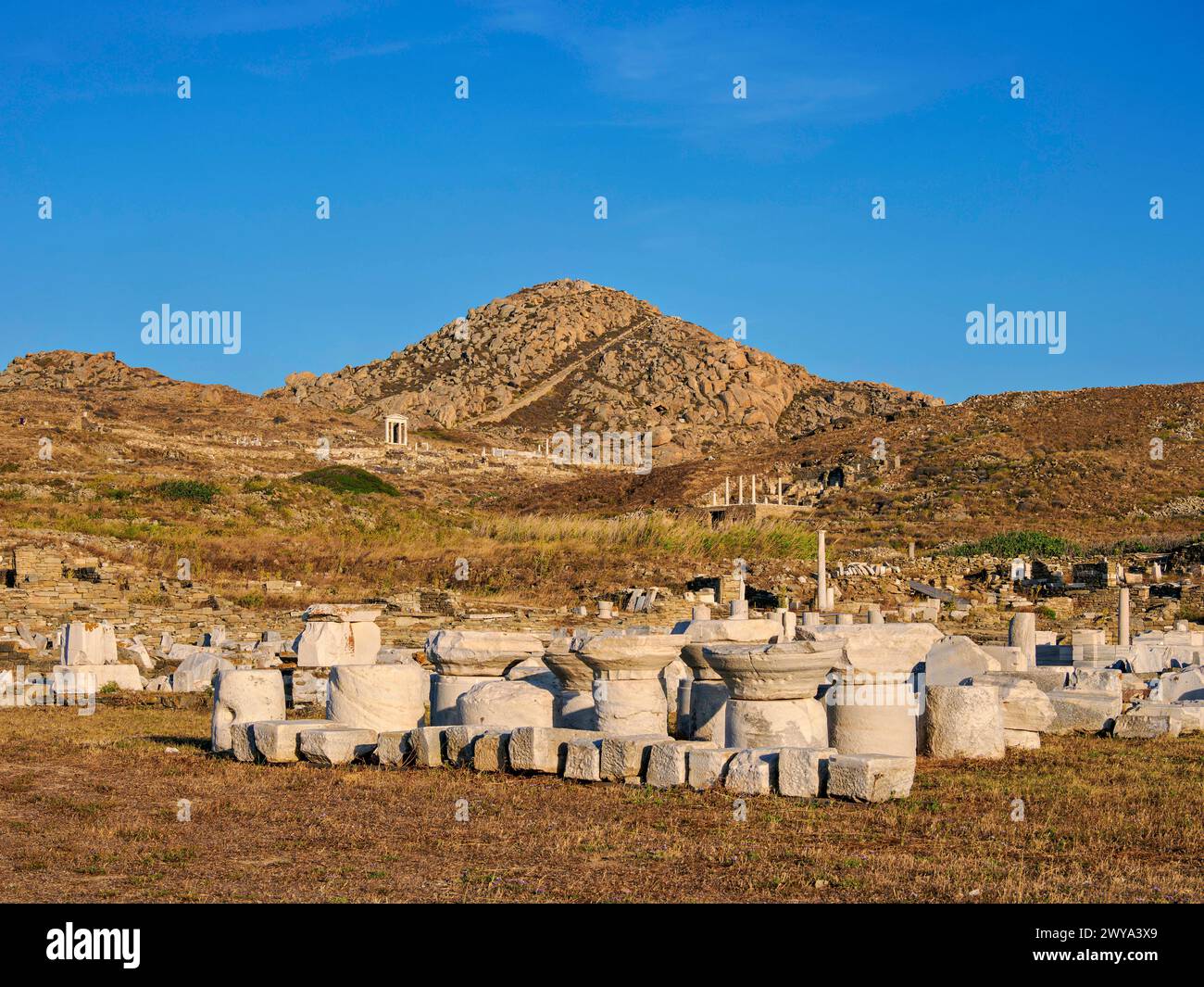 View towards the Mount Kynthos at sunset, Delos Archaeological Site, UNESCO World Heritage Site, Delos Island, Cyclades, Greek Islands, Greece, Europe Stock Photo