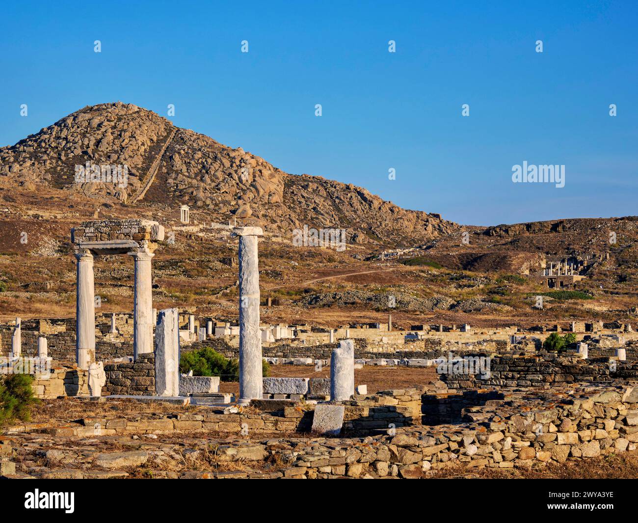 View towards the Mount Kynthos at sunset, Delos Archaeological Site, UNESCO World Heritage Site, Delos Island, Cyclades, Greek Islands, Greece, Europe Stock Photo