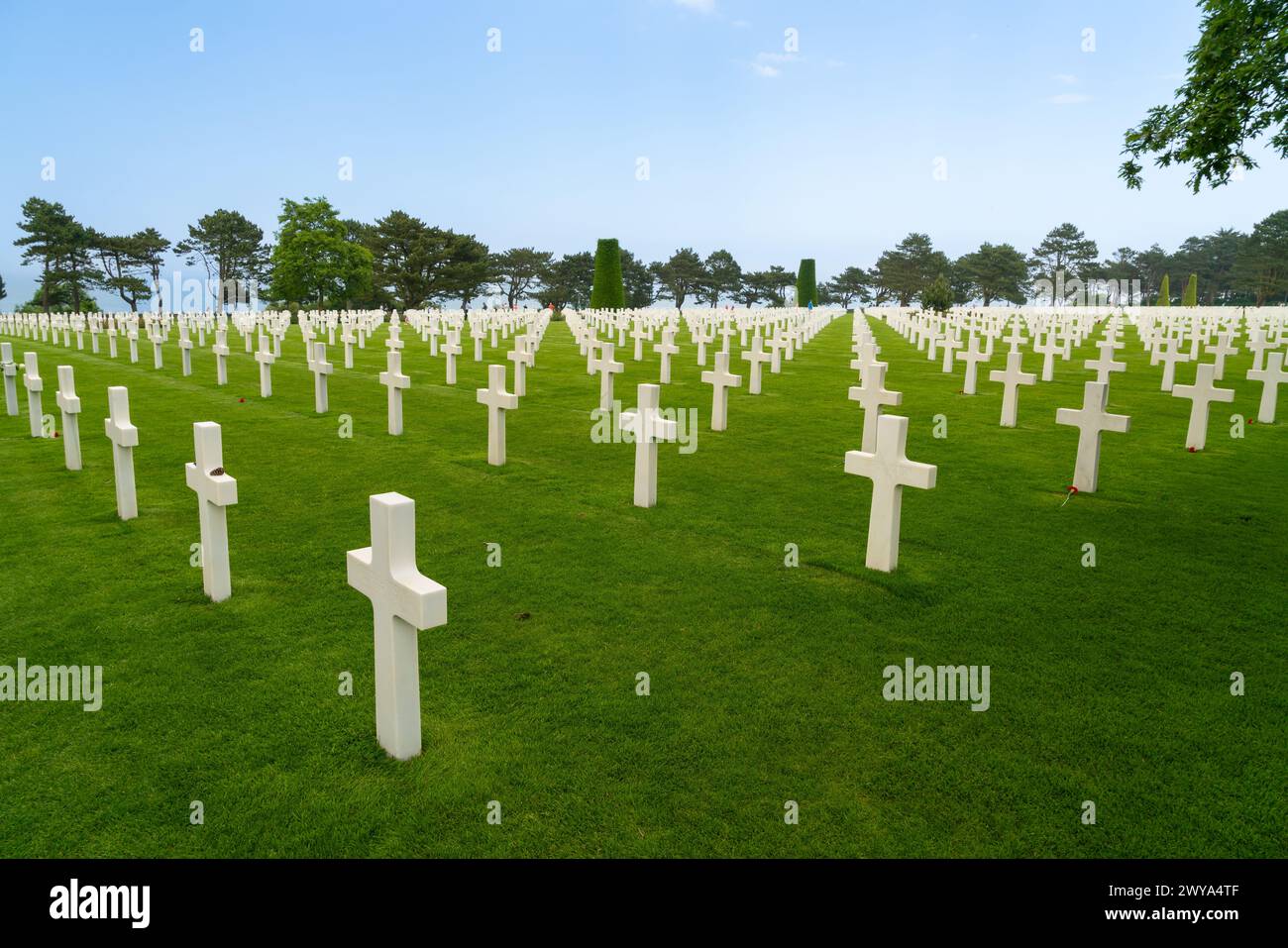 NORMANDY, FRANCE - June 1, 2017: Rows of white crosses marking graves in the American Cemetery Colleville-sur-Mer Omaha D-Day Beach Normandy Stock Photo