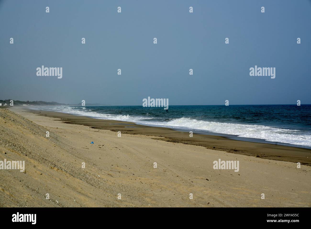 A beautiful sandy beach under a clear sky in Sellia Marina, Calabria, Italy Stock Photo