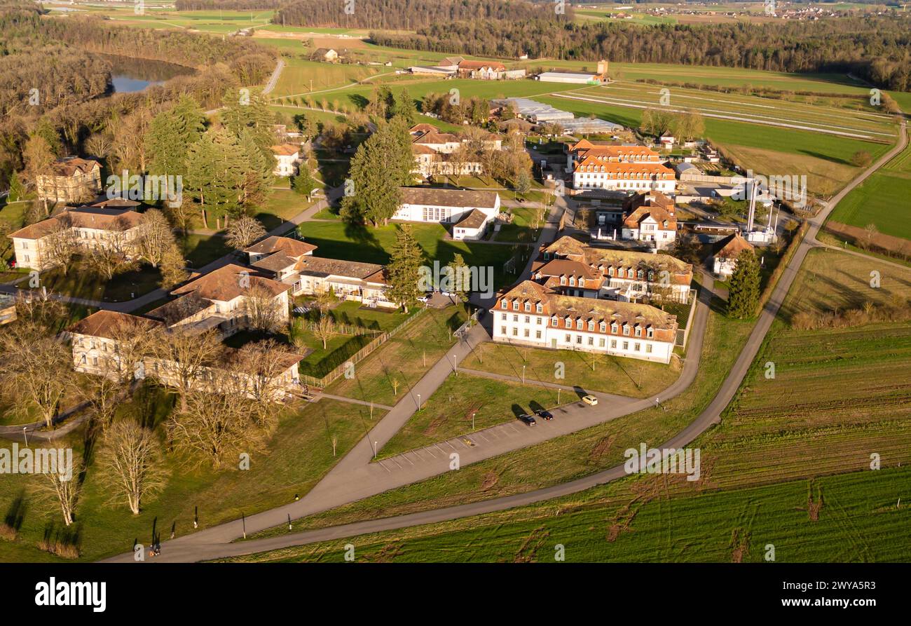 The Psychiatric University Clinic is located in Rheinau. Behind it flows the Rhine. The Zurich community has a long history in the medical field of ps Stock Photo