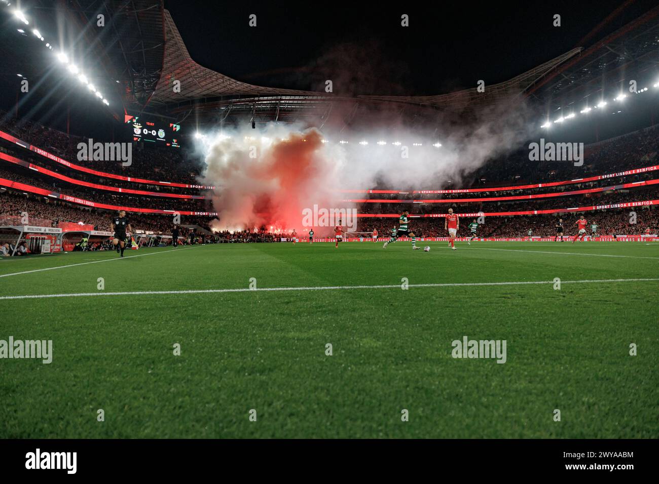 Fans of Benfica using pyrotechnics  during Taca de Portugal second semifinal game between SL Benfica and Sporting CP at Estadio Da Luz, Lisbon, Portug Stock Photo