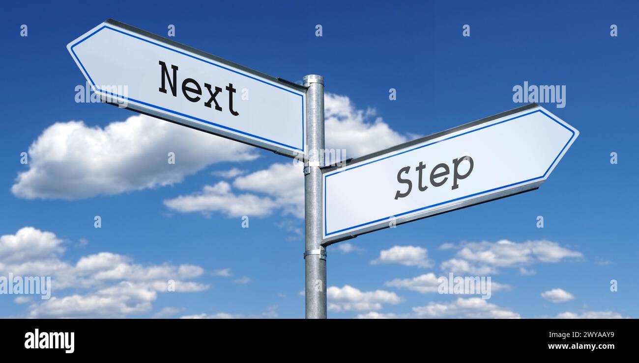 Next step - metal signpost with two arrows Stock Photo - Alamy