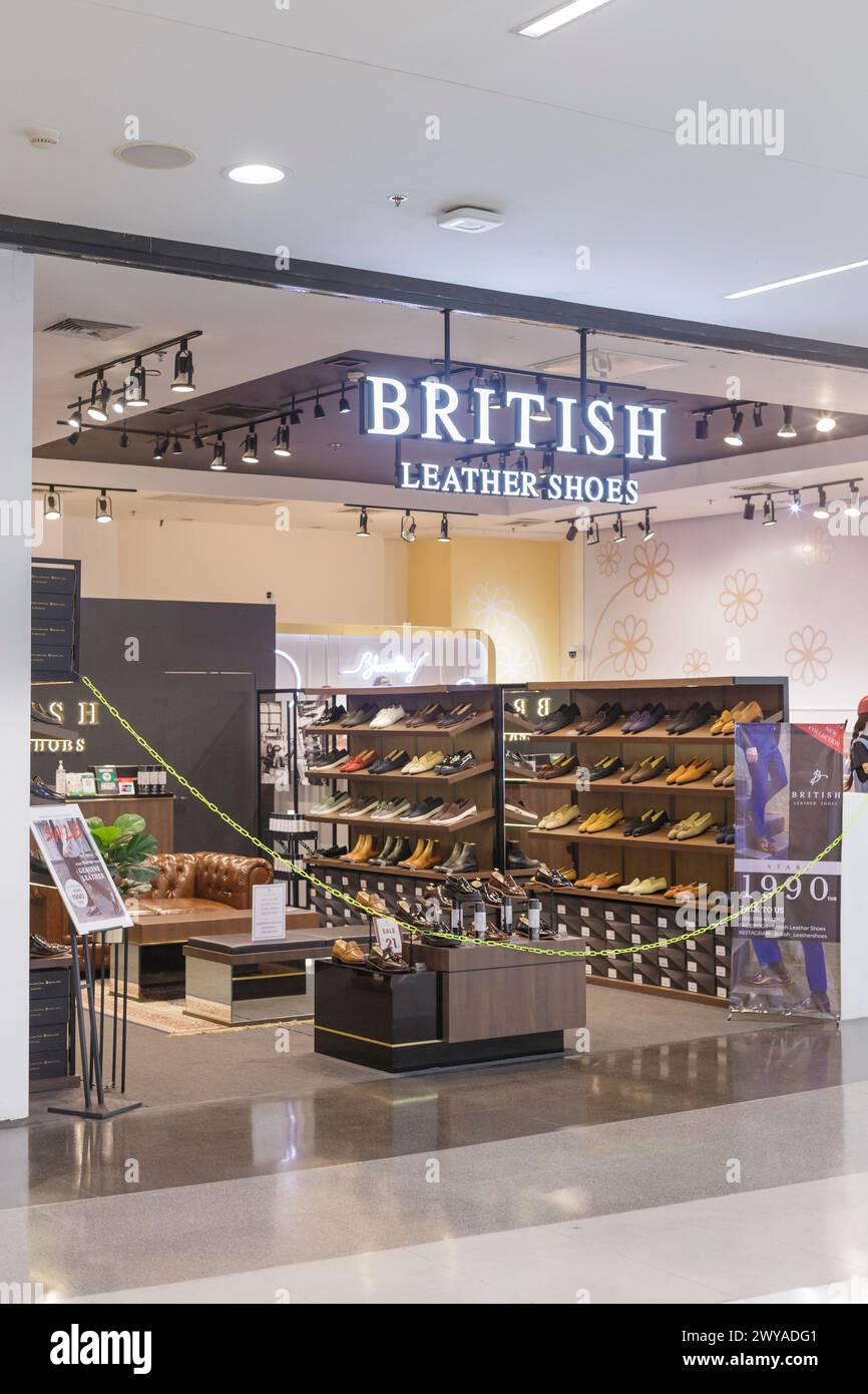 British leather shoes shop at Central shopping mall Stock Photo