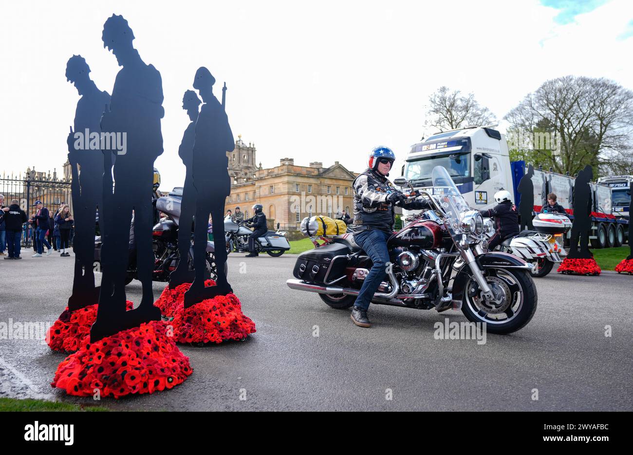 Harley Davidson riders arrive at Blenheim Palace in Oxfordshire, ahead of travelling in convoy with four lorries carrying giant silhouettes from the For Your Tomorrow installation to France. 1,475 Standing with Giants silhouettes will be placed at the British Normandy Memorial, overlooking Gold Beach, for the 80th anniversary of D-Day. Picture date: Friday April 5, 2024. Stock Photo