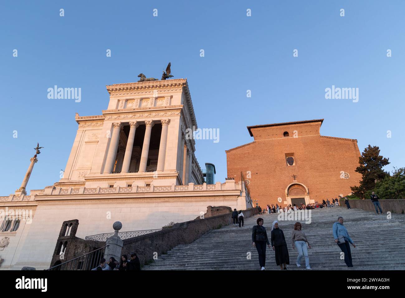 Rome, Italy. 4th Apr, 2024. Tourists on Ara Coeli steps at sunset in Rome (Credit Image: © Matteo Nardone/Pacific Press via ZUMA Press Wire) EDITORIAL USAGE ONLY! Not for Commercial USAGE! Stock Photo