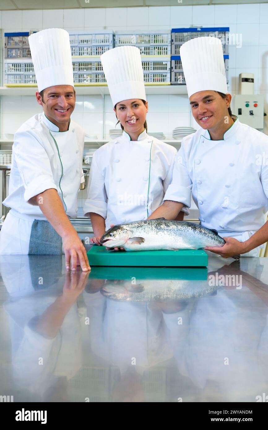 Chefs, salmon. Luis Irizar cooking school. Donostia, Gipuzkoa, Basque Country, Spain. Stock Photo