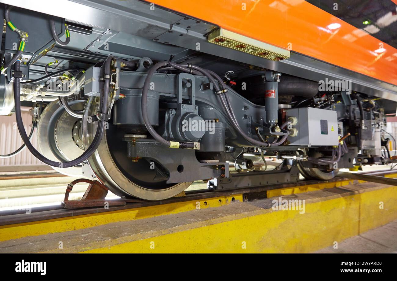 Railroad wheels. Assembly workshop trams. Manufacture of trains. Stock Photo