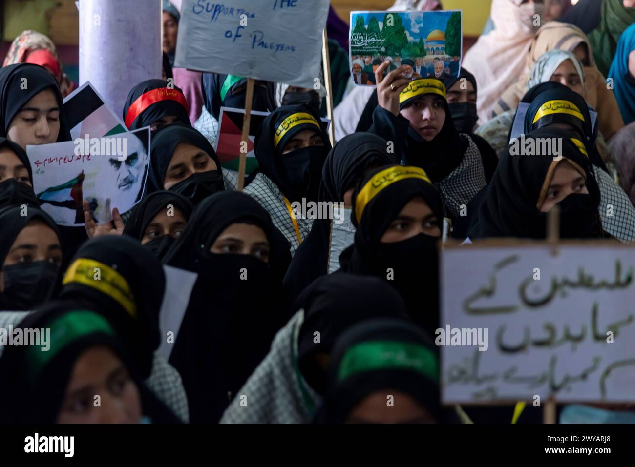 Srinagar, India. 05th Apr, 2024. Kashmiri Muslim women hold posters ...