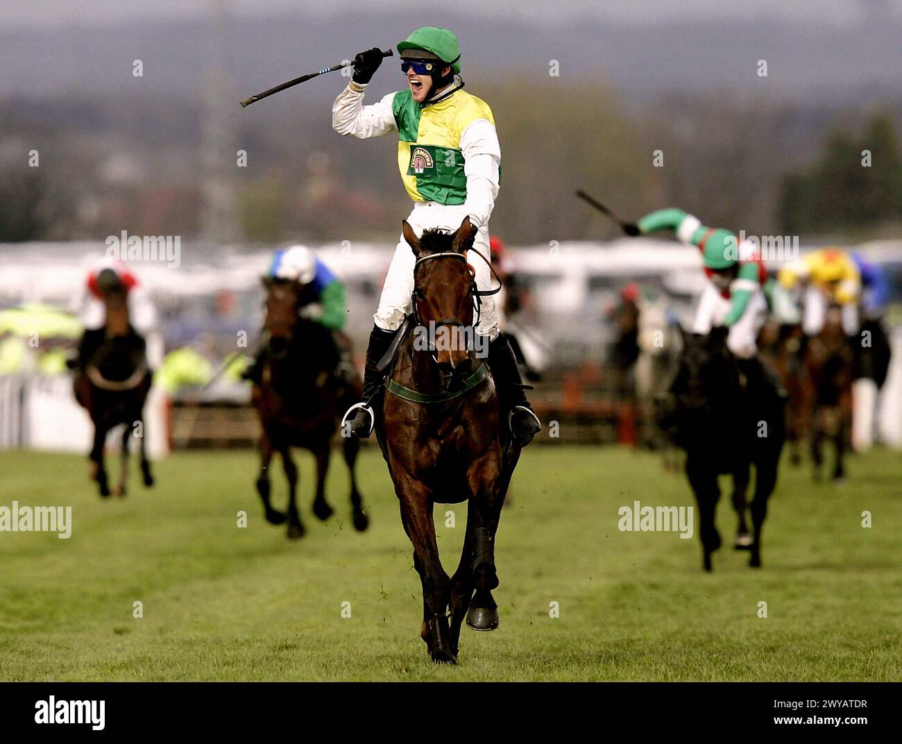 File photo dated 09-04-2005 of Hedgehunter with jockey Ruby Walsh. 2005: HEDGEHUNTER becomes the first horse since Corbiere in 1983 to carry more than 11st to victory in the great race, romping clear in great style under Ruby Walsh to slam Royal Auclair by 14 lengths. Issue date: Friday April 5, 2024. Stock Photo